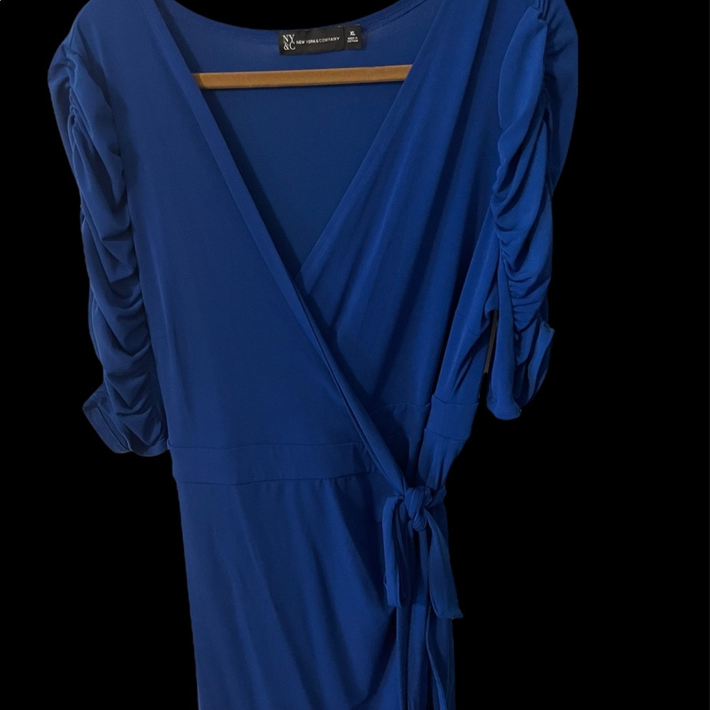 Wrap dress size Large never worn. NWOT only tried on.